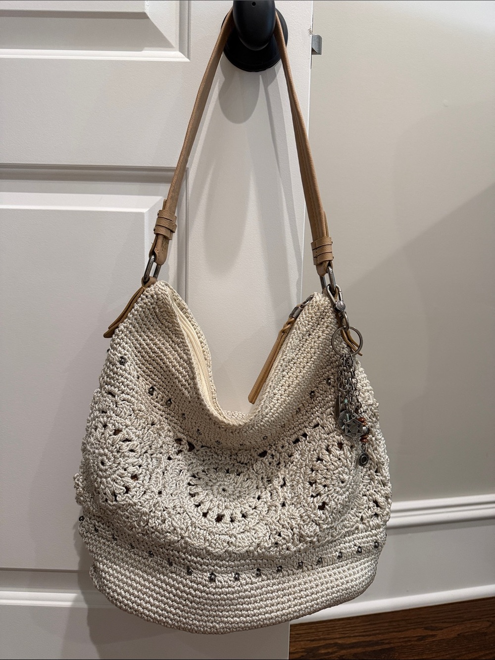 The Sak Cream Crochet Hobo Shoulder Bag with Tan Strap